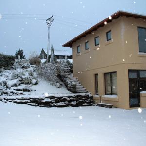 The Cottage Under Snow